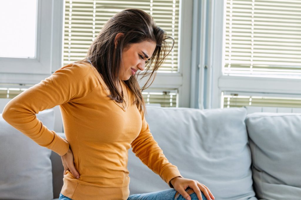 fibroid back pain woman