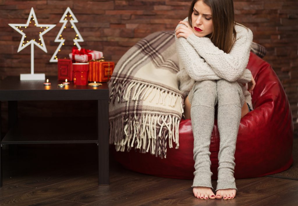 heavy periods doubling up winter holiday pain woman