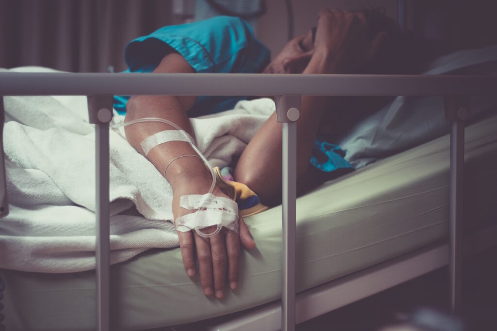 uterine fibroid embolization ufe woman in hospital bed