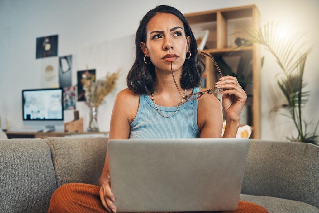 uterine fibroid embolization ufe woman thinking research on laptop