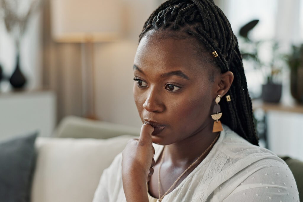 what size fibroid is dangerous: stress anxiety woman biting nails