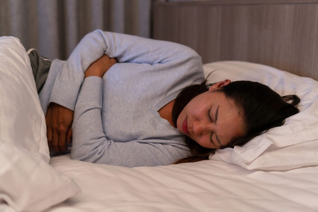 what size fibroid is dangerous: woman trouble sleeping belly discomfort