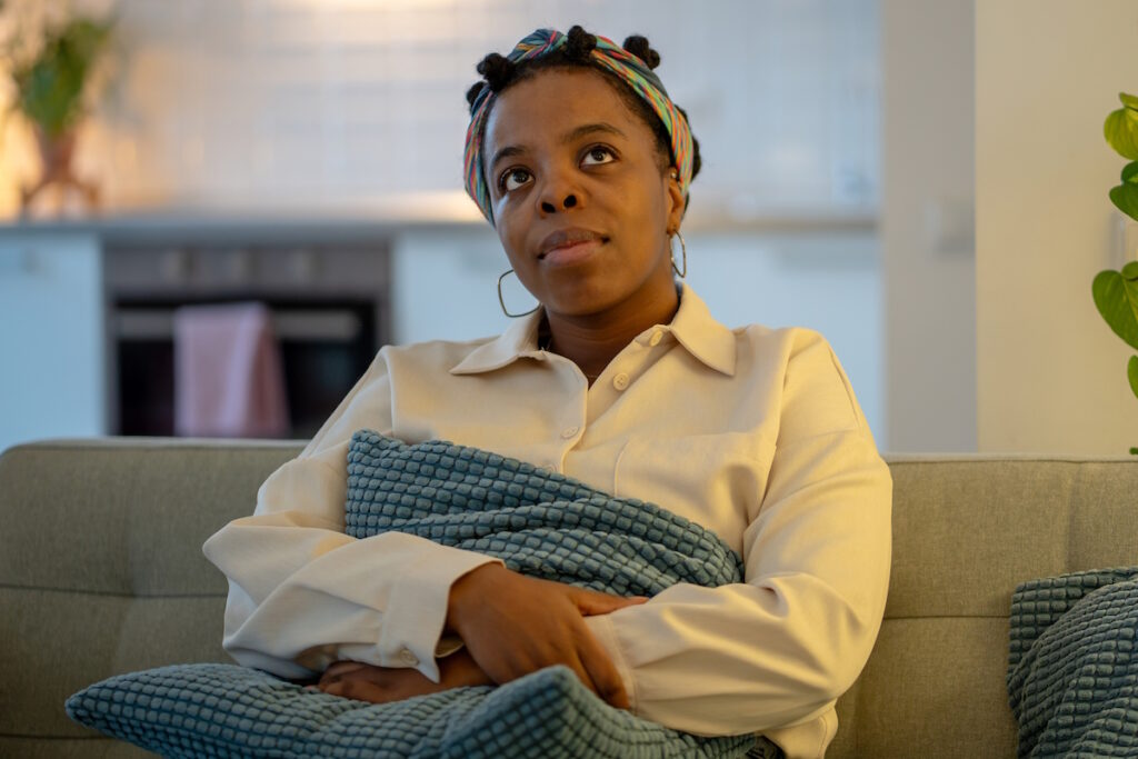 emergency fibroid symptoms woman thinking wondering istock2260895996